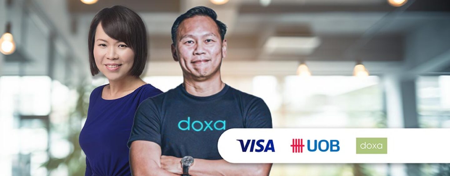 Visa UOB Doxa A photo with VISA, UOB and Doxa Holdings logo with two people - Doxa Holdings